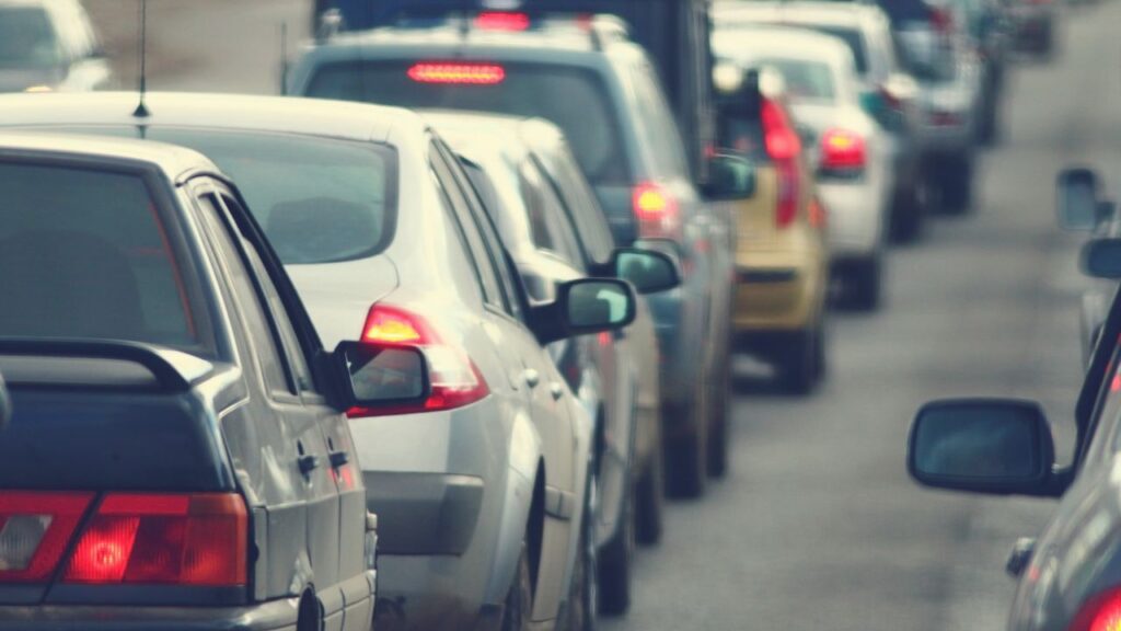 "Cars lined up on Murrieta Hot Springs Road during peak hours, reflecting increasing traffic congestion in the area.