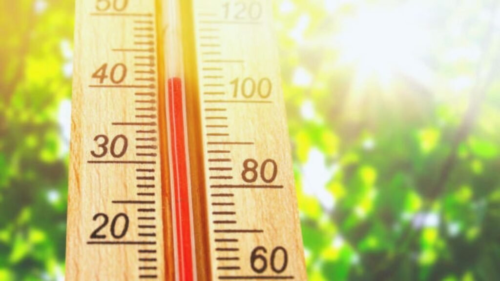 High summer temperature displayed on a backyard thermometer in Menifee, California, during peak heat season.