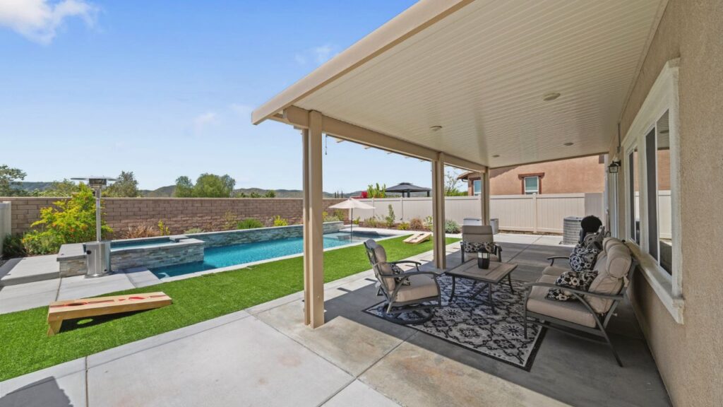 Backyard pool in Murrieta during hot summer weather.
